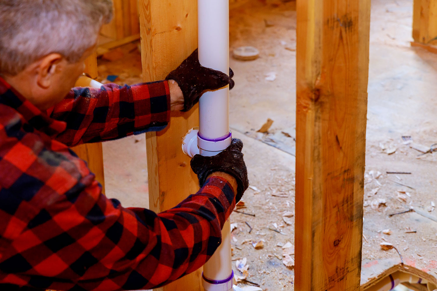 plumber installing pvc pipe at under construction 2022 11 29 00 25 43 utc